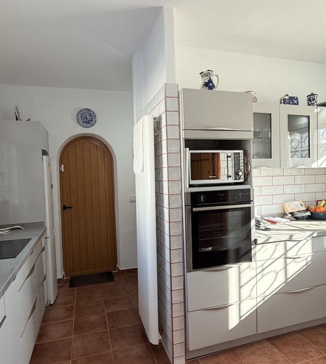 Resa estates ibiza for sale te koop villa huis zwembad san jose kitchen.jpeg